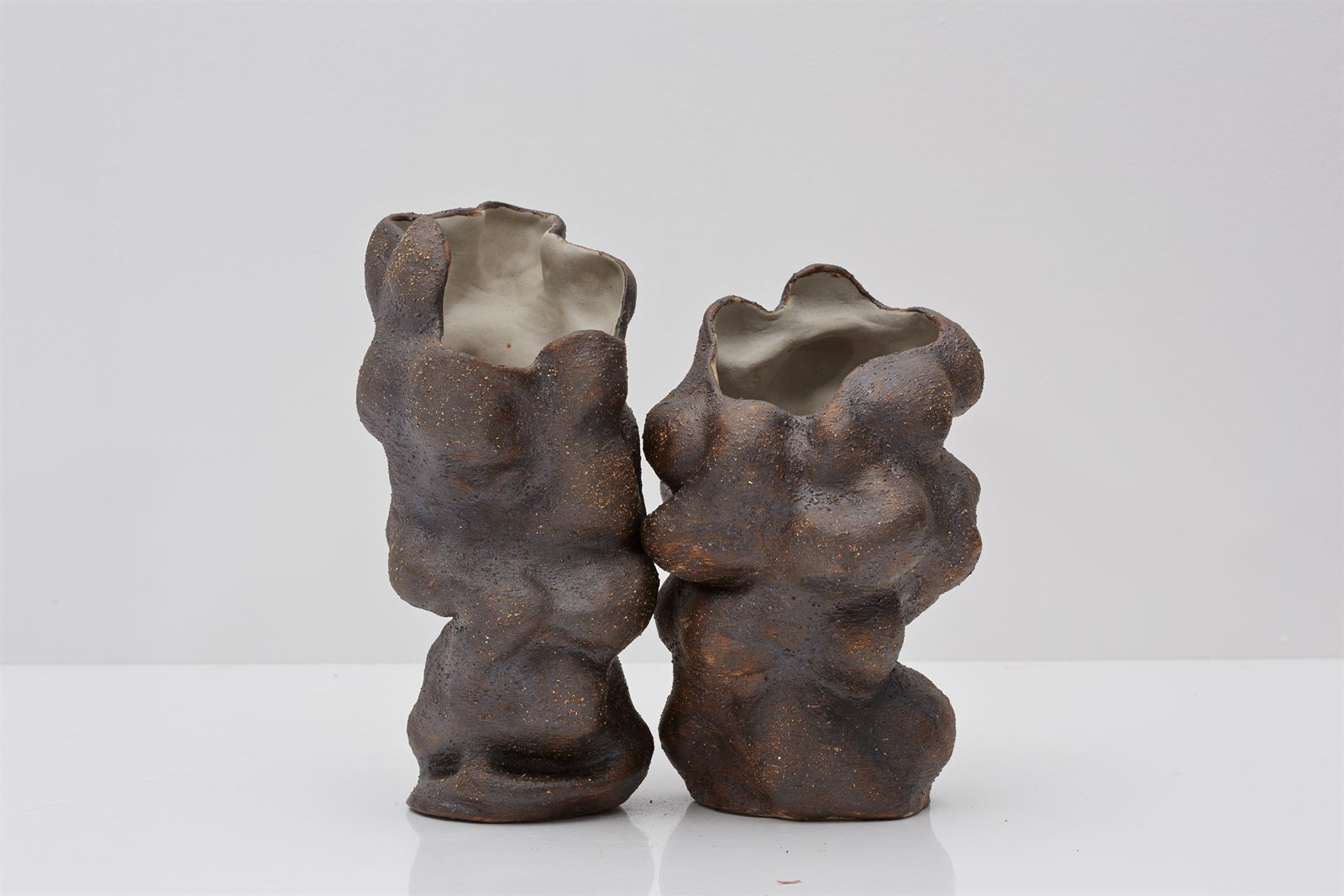 Family, two white stoneware vessels standing together