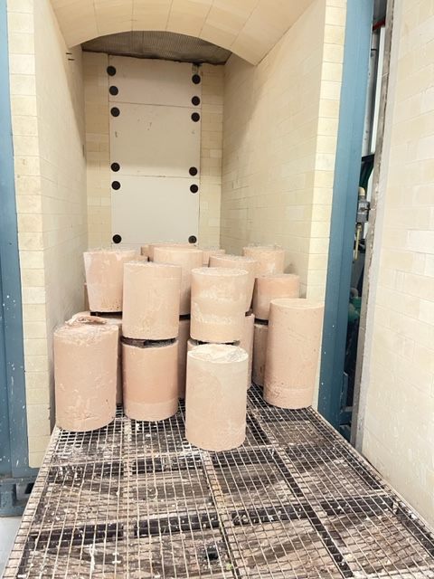 Casting flasks stacked in the burnout kiln