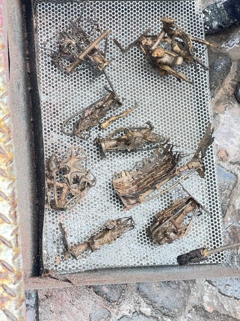Rough bronze castings after being broken out of the investment moulds
