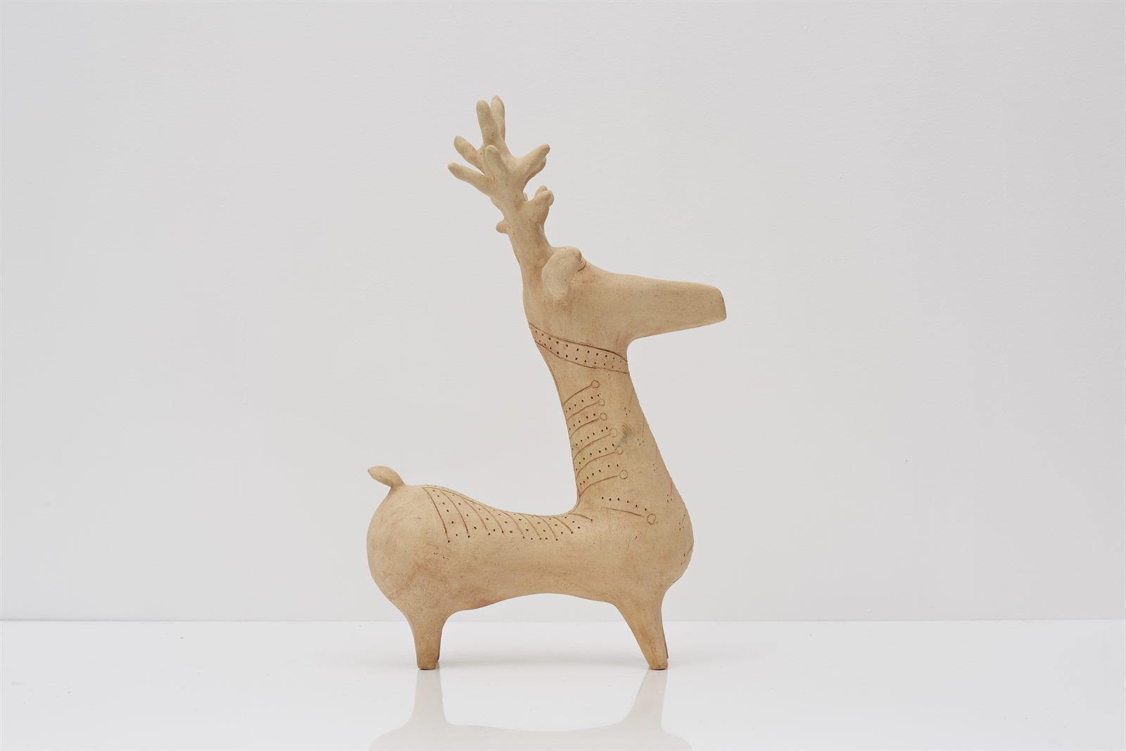 Marlik Deer — a hand-built ceramic deer vessel with incised decoration, side view